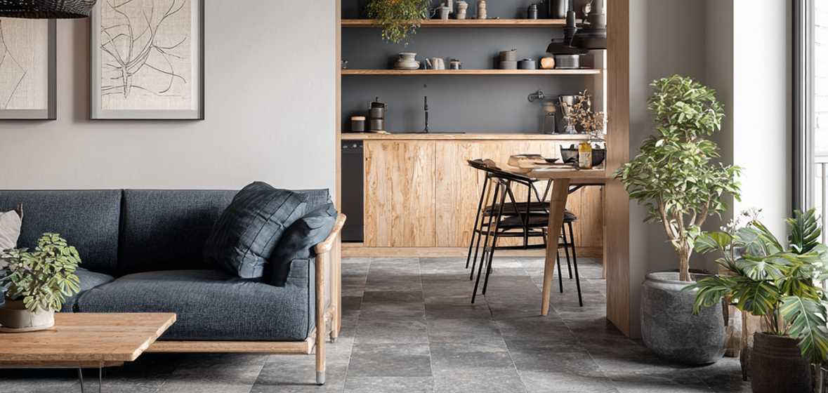 Modern open‑plan living space with large gray tiled flooring