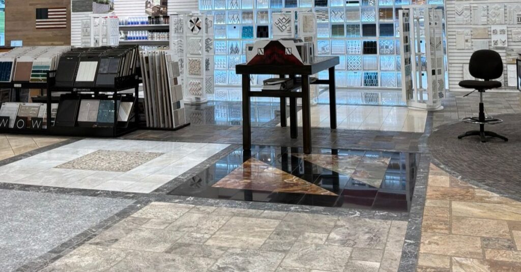 Interior of Floors USA displaying an assortment of flooring types, such as laminate, vinyl, and tile.