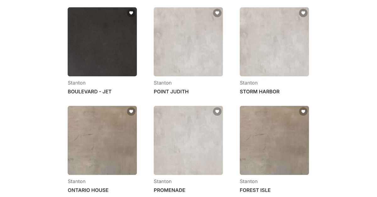 A collection of tile samples showcasing various colors and textures arranged neatly on a display surface.