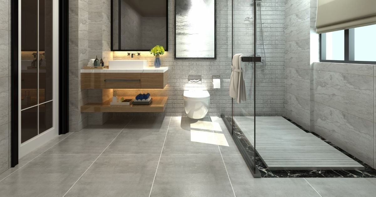 A modern bathroom featuring a sleek shower, toilet, and sink with contemporary design elements.