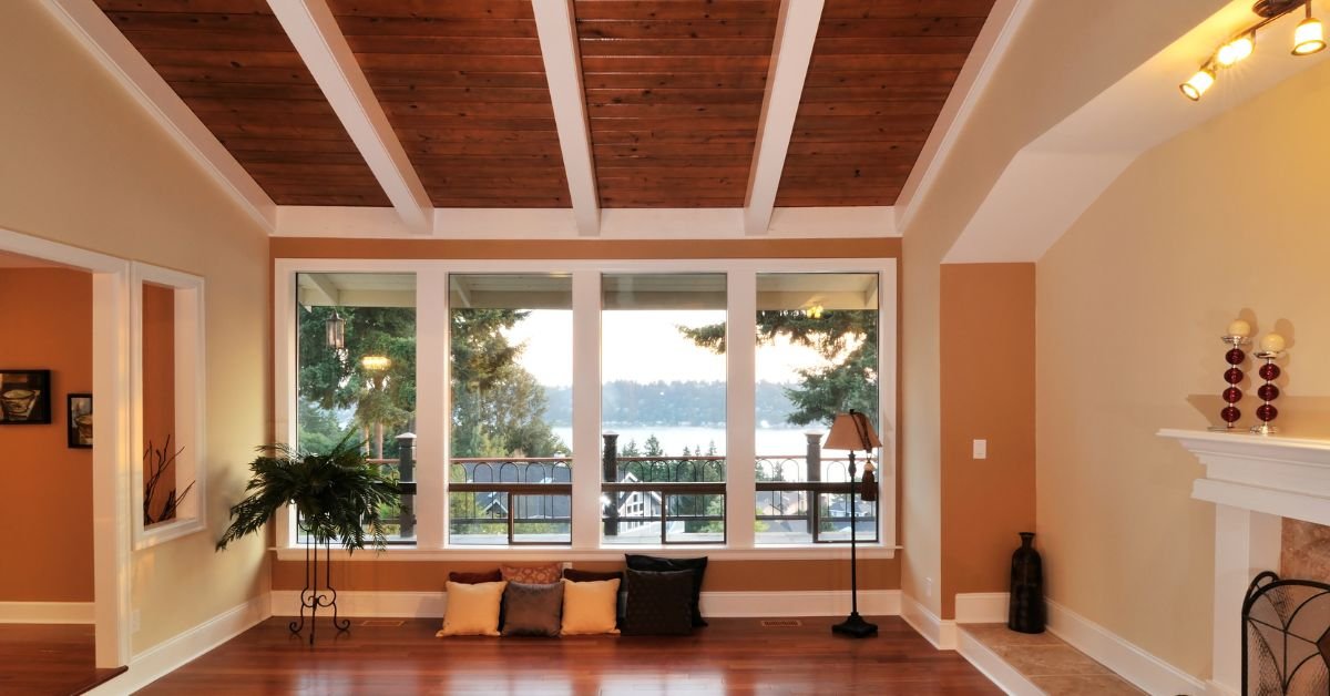 A stylish living room with polished hardwood floors and a classic fireplace, enhancing the room's charm.