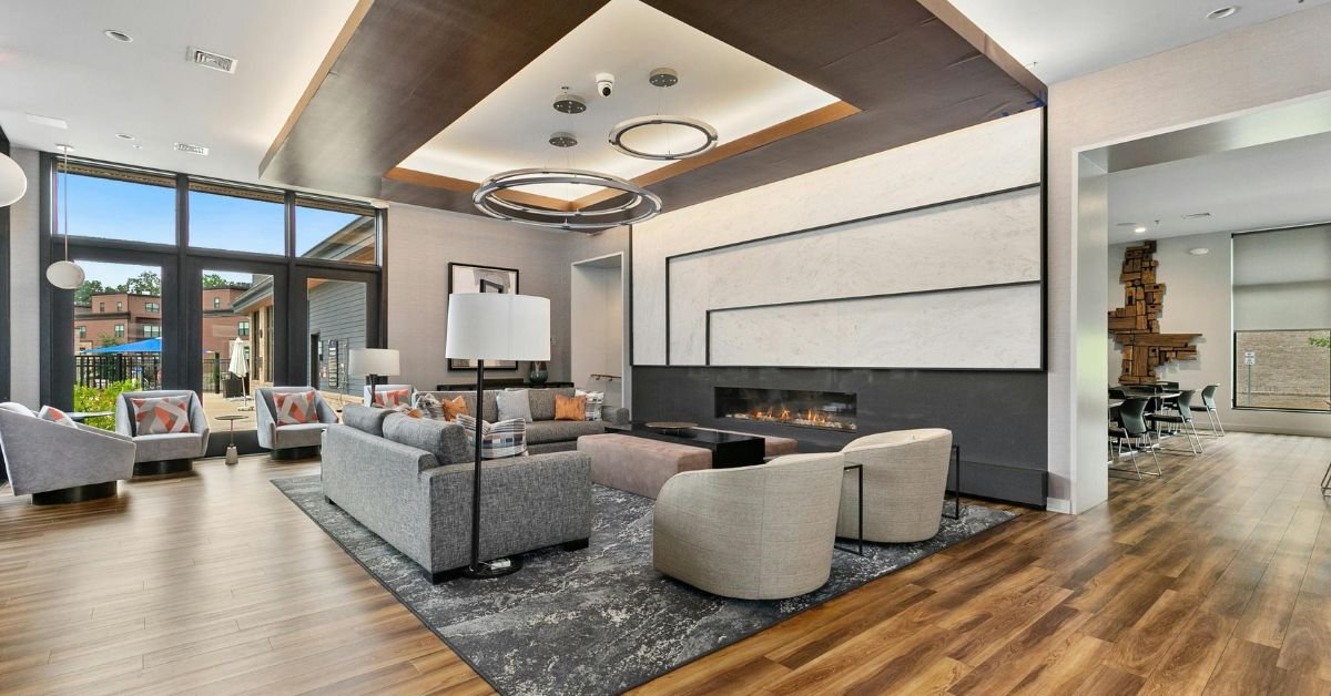 Living room in the park at the north end, featuring comfortable seating and large windows overlooking green spaces.